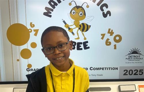 Boy posing for math bee competition